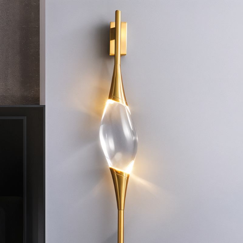 Nástěnná lampa Lumencrest v kartáčovaném zlatě s krystalovým kapkovým závěsem a integrovanými LED