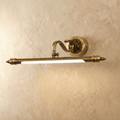 Retro lampa ścienna Copperlume z ozdobną podstawą i żłobionymi detalami