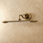 Retro lampa ścienna Copperlume z ozdobną podstawą i żłobionymi detalami