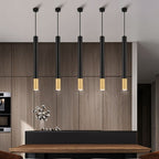 Minimalistyczna lampa wisząca Cylinder ze złotym akcentem do wysp kuchennych