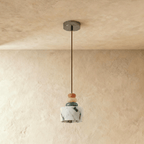 Lampada a Sospensione TerraLume con Venature di Pietra e Bagliore Caldo Diffuso  