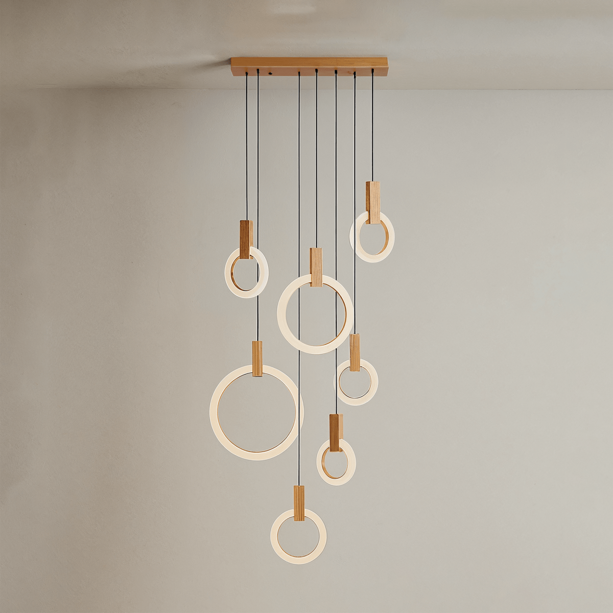 Aurora Loop Chandelier With Acrylic Ring Heads And Wooden Base